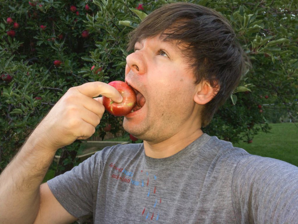 john eating an apple
